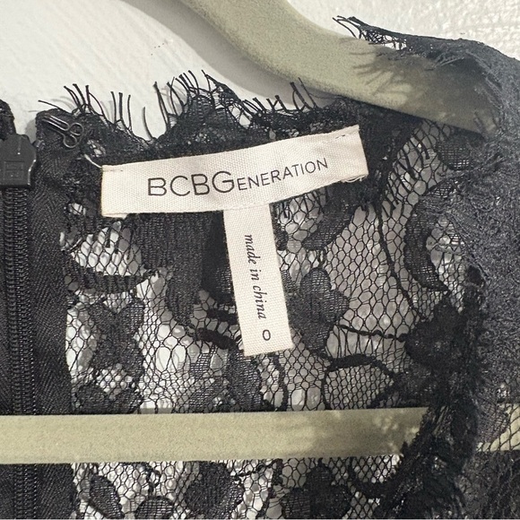 BCBG Generation Black Lace Cap Sleeve Cocktail Dress Lined Pleated Skirt Size 0 - Picture 3 of 6